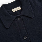 Kashmir cardigan with collar and button closure, close-up of fabric and brand