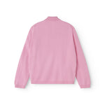 Pink polo shirt seen from behind with a round/soft high collar and long sleeves