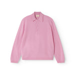 Pink polo shirt with a collar and front button closure, long sleeves.