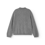 Gray melange cashmere polo with long sleeves and collar cut (seen from behind).