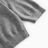 Gray blend knitted sleeve edge with ribbing on a Kashmir polo.