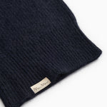 Kashmir hue in dark indigo with folded finish and label.