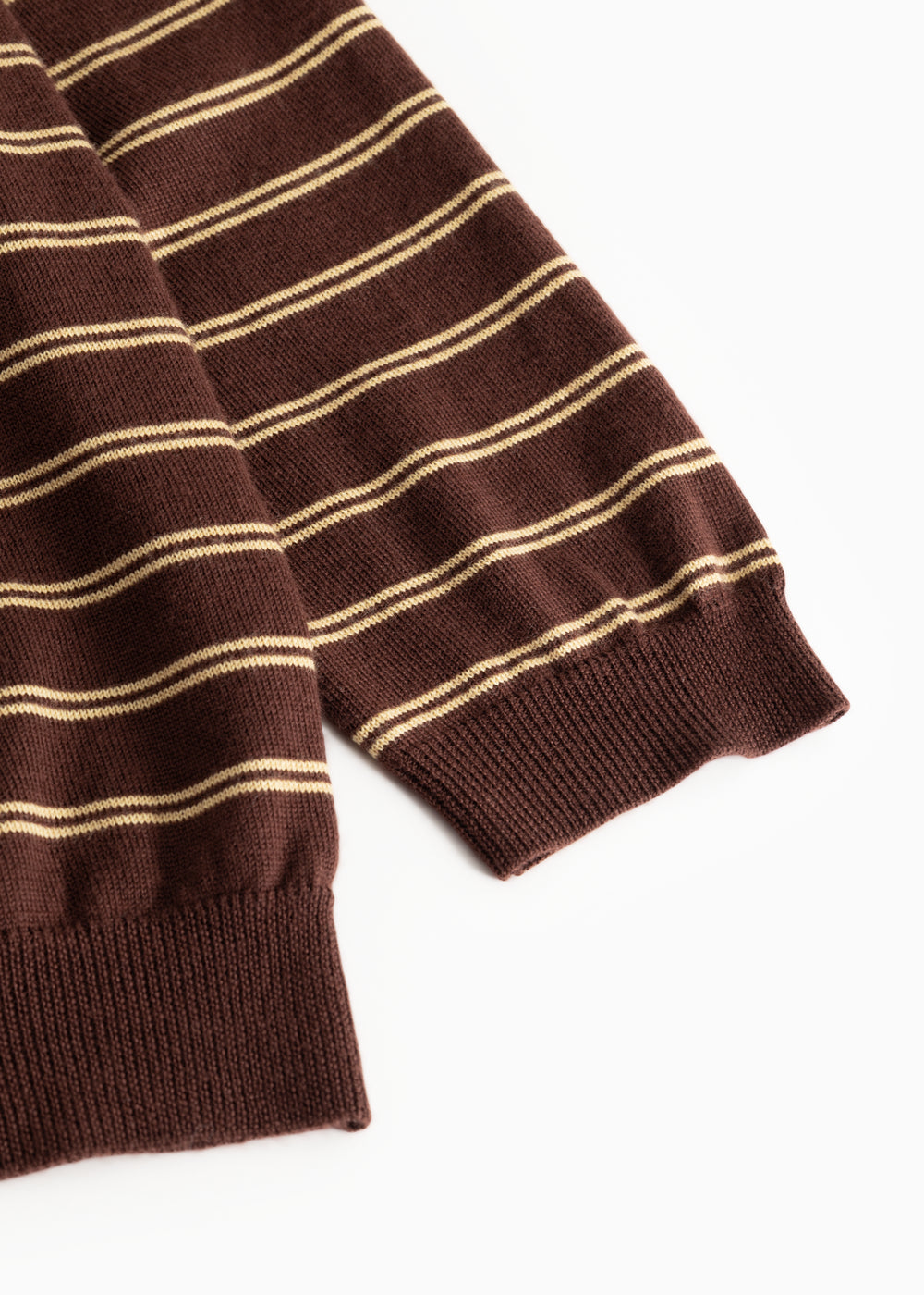 Dark striped polo shirt with ribbed edge at the sleeve end and bottom edge