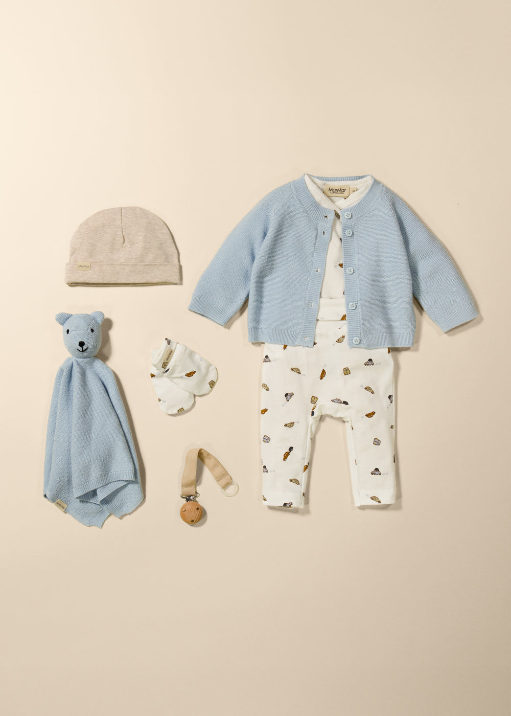 Blue baby pants with small cars, all-over pattern and elastic waist.